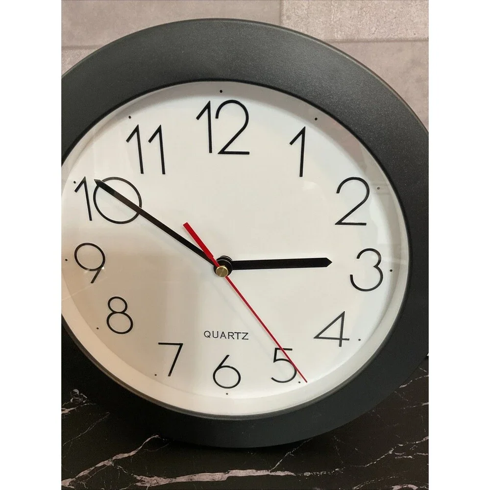 Universal Wall Clock 9 3/4 In Diameter Black Case